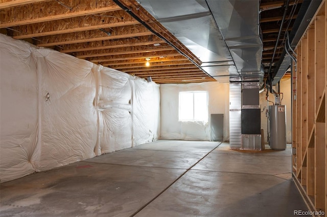 below grade area featuring water heater