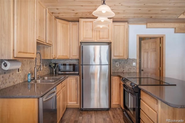 13 Paradise Rd, Crested Butte, CO 81225 - kitchen featuring appliances with stainless steel finishes, light brown cabinetry, a peninsula, dark countertops, and wooden ceiling
