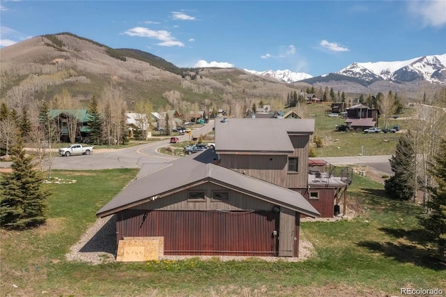 13 Paradise Rd, Crested Butte, CO 81225 - back of house featuring a mountain view and a yard