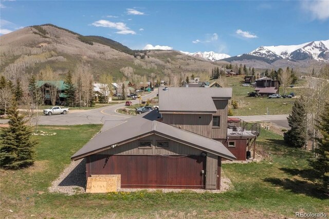 13 Paradise Rd, Crested Butte, CO 81225 - back of house featuring a mountain view and a yard