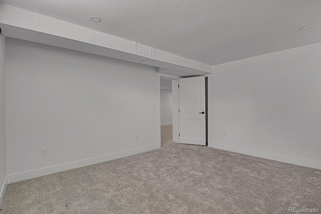 empty room with carpet flooring