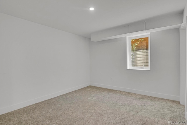 empty room featuring carpet flooring