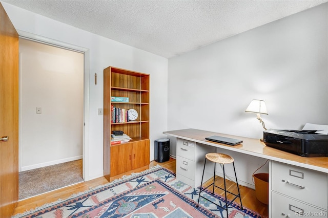 1161 S Johnson Way, Lakewood, CO 80232 - office area with light wood-type flooring and a textured ceiling