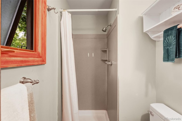 1161 S Johnson Way, Lakewood, CO 80232 - full bathroom featuring a shower stall and toilet