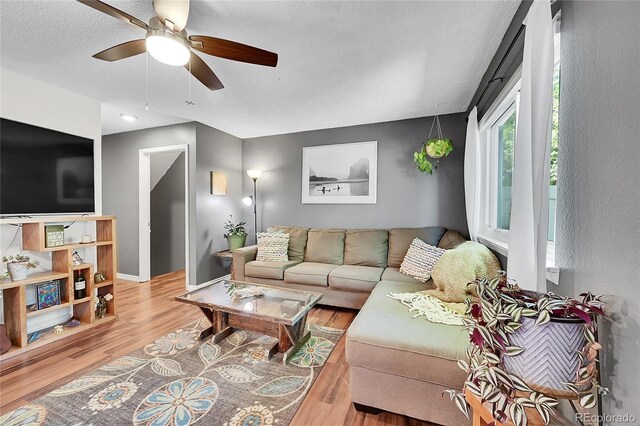 1711 Cato Cir Unit 21, Lafayette, CO 80026 - living area with wood finished floors and a ceiling fan