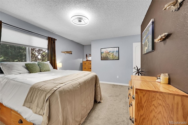1711 Cato Cir Unit 21, Lafayette, CO 80026 - bedroom featuring light carpet and a textured ceiling