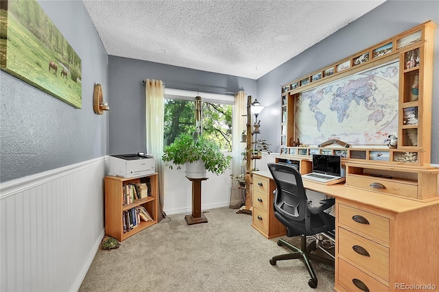 1711 Cato Cir Unit 21, Lafayette, CO 80026 - office area featuring a textured ceiling, light colored carpet, and a wainscoted wall