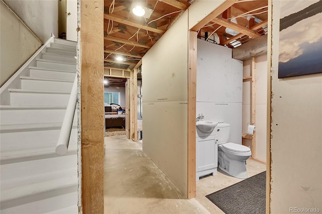1711 Cato Cir Unit 21, Lafayette, CO 80026 - unfinished basement featuring a sink and stairs