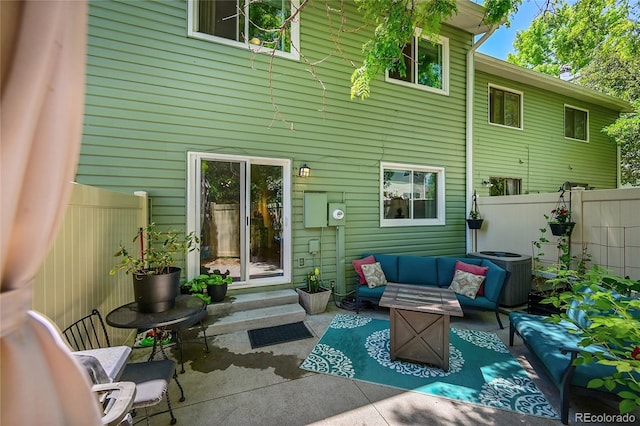 1711 Cato Cir Unit 21, Lafayette, CO 80026 - rear view of house with outdoor lounge area and a patio area