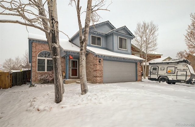 view of front of property featuring a garage