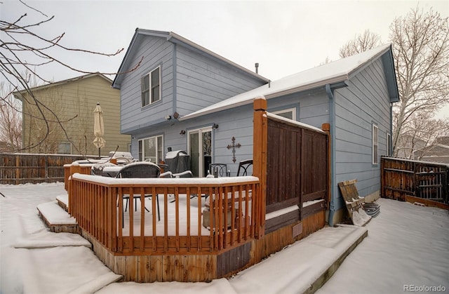 rear view of property with a deck