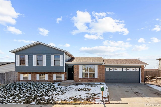 split level home featuring a garage