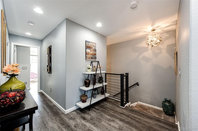 corridor featuring dark hardwood / wood-style flooring