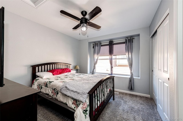 carpeted bedroom with ceiling fan and a closet