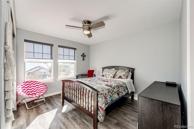 bedroom featuring ceiling fan and wood-type flooring