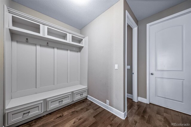 7720 S Queensburg Way, Aurora, CO 80016 - mudroom featuring dark wood-style flooring and baseboards