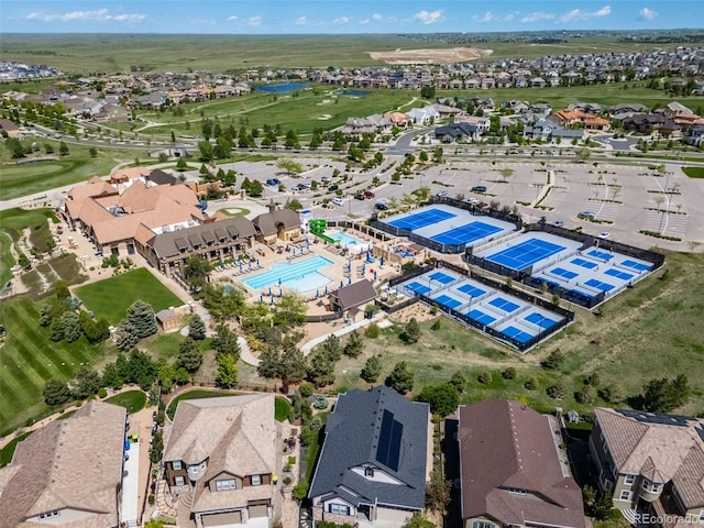 7720 S Queensburg Way, Aurora, CO 80016 - aerial perspective of suburban area with a pool area and a golf club