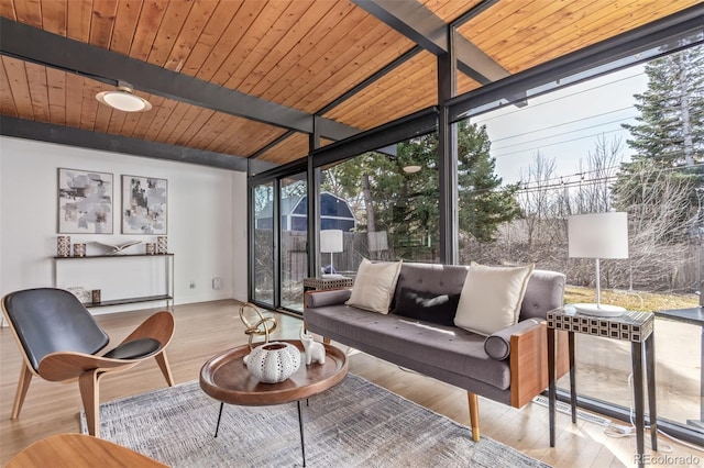 sunroom / solarium with beam ceiling and wood ceiling