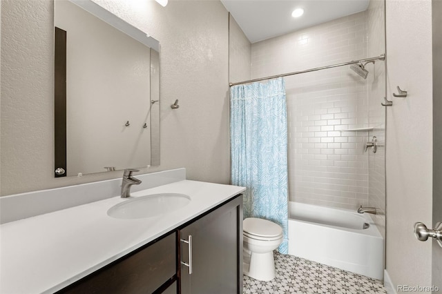 1615 Harlan St Unit 2, Lakewood, CO 80214 - bathroom featuring toilet, shower / bath combo with shower curtain, vanity, and recessed lighting