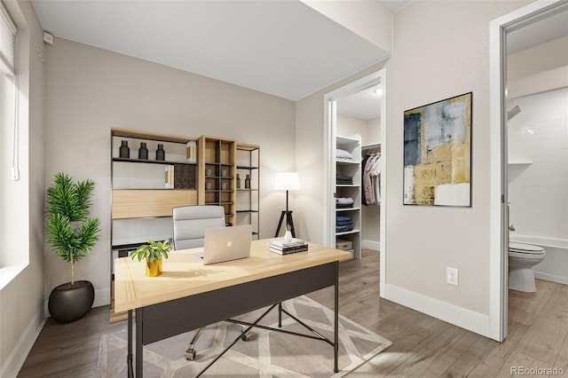 1615 Harlan St Unit 2, Lakewood, CO 80214 - office with wood finished floors and baseboards