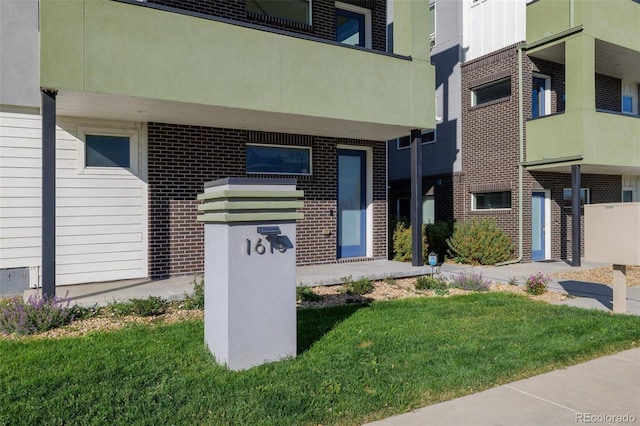 1615 Harlan St Unit 2, Lakewood, CO 80214 - exterior space with a yard
