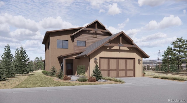 view of front of home with roof with shingles, concrete driveway, and an attached garage