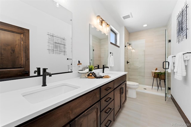 full bathroom with double vanity, visible vents, a shower stall, and a sink