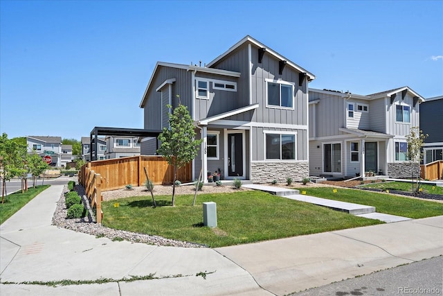 1100 Blue Bell Rd, Berthoud, CO 80513 - view of front of home featuring board and batten siding, stone siding, and a residential view