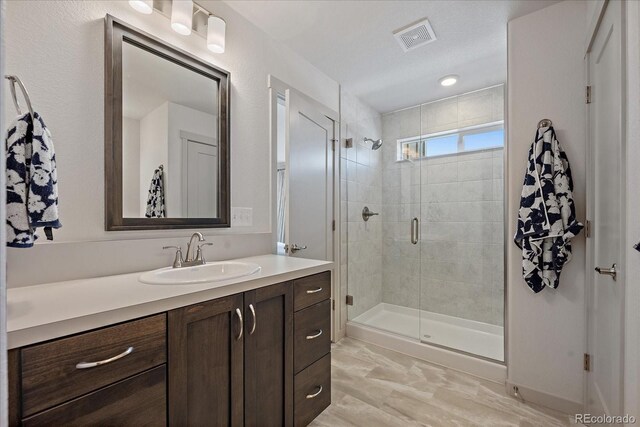 1100 Blue Bell Rd, Berthoud, CO 80513 - bathroom with vanity and a shower stall