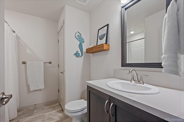 1100 Blue Bell Rd, Berthoud, CO 80513 - bathroom with vanity, toilet, wood finished floors, and a shower with curtain