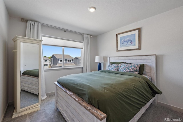 1100 Blue Bell Rd, Berthoud, CO 80513 - carpeted bedroom featuring baseboards