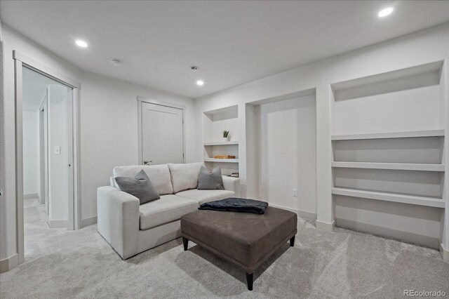 1100 Blue Bell Rd, Berthoud, CO 80513 - living room with carpet, built in shelves, recessed lighting, and baseboards