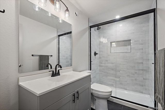 1100 Blue Bell Rd, Berthoud, CO 80513 - full bath featuring a shower stall, vanity, and toilet