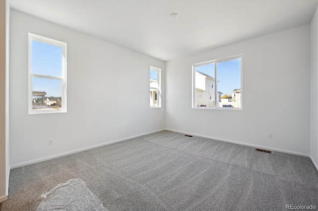 view of carpeted spare room