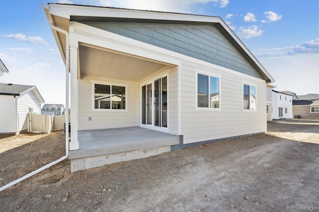 back of house with a patio area