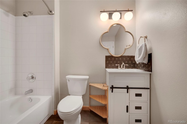 8500 E Jefferson Ave Unit 11C, Denver, CO 80237 - bathroom featuring vanity, shower / washtub combination, and toilet