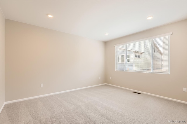 4102 Estrella St, Brighton, CO 80601 - unfurnished room featuring light colored carpet and recessed lighting