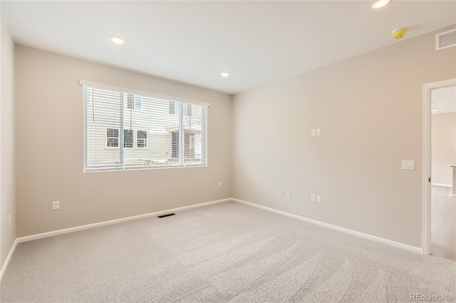 4102 Estrella St, Brighton, CO 80601 - empty room with carpet, a smoke detector, and recessed lighting