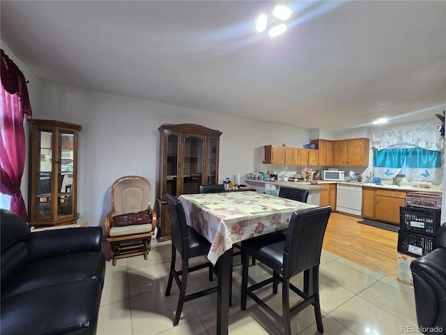7371 Granada Rd, Denver, CO 80221 - dining room with light tile patterned floors