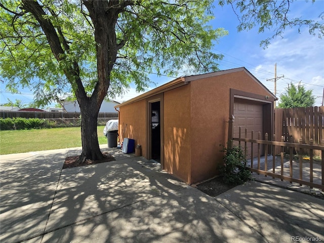 7371 Granada Rd, Denver, CO 80221 - garage featuring driveway