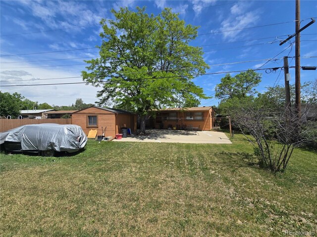 7371 Granada Rd, Denver, CO 80221 - view of yard featuring a patio area