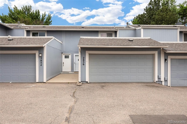 2856 S Kenton Ct, Aurora, CO 80014 - multi unit property featuring roof with shingles