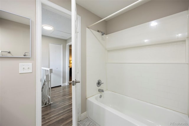 2856 S Kenton Ct, Aurora, CO 80014 - full bath with shower / bathtub combination and wood finished floors