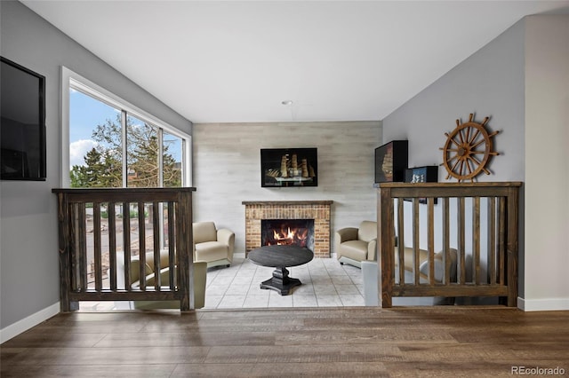 2856 S Kenton Ct, Aurora, CO 80014 - living area with a fireplace and wood finished floors