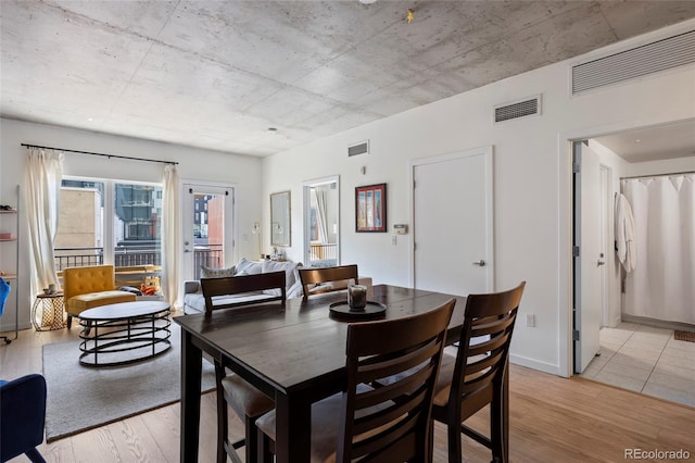 1475 Delgany St Unit 307, Denver, CO 80202 - dining room featuring light wood-type flooring
