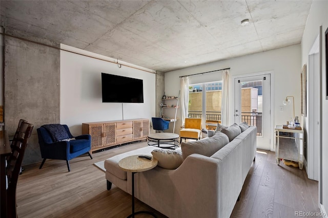 1475 Delgany St Unit 307, Denver, CO 80202 - living area with wood finished floors