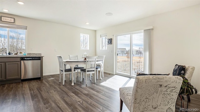 dining room featuring recessed lighting, dark wood finished floors, and baseboards