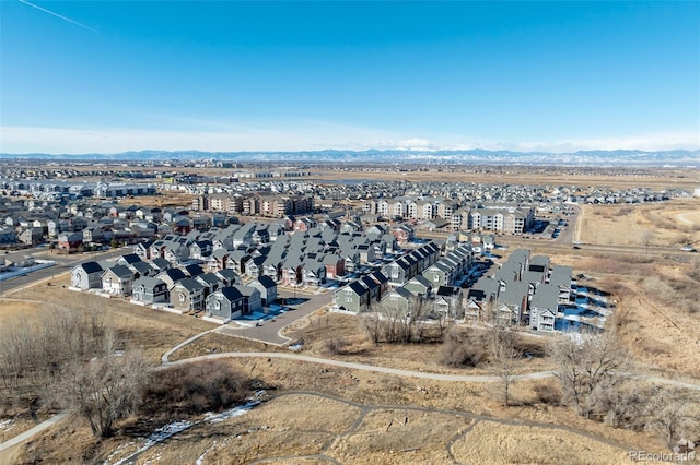 aerial view featuring a mountain view and a residential view