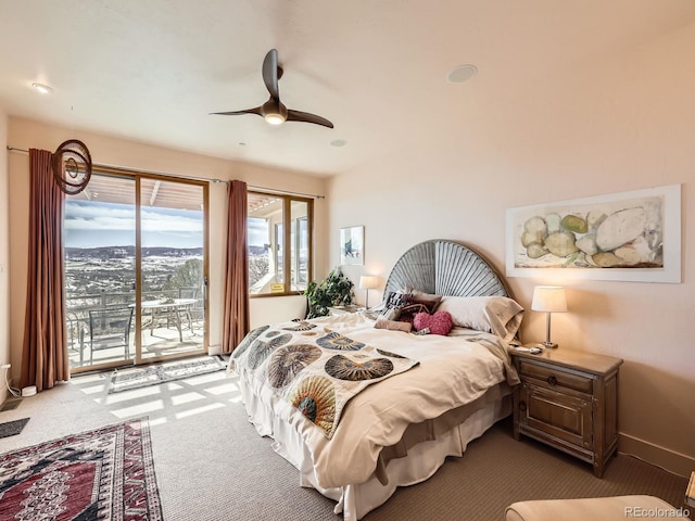 bedroom with ceiling fan, carpet floors, baseboards, and access to exterior