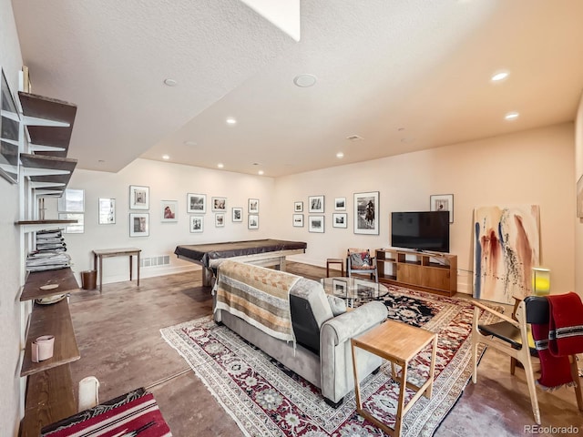 living room with concrete flooring, a textured ceiling, recessed lighting, pool table, and visible vents